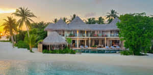 Stunning Overwater Bungalows In Maldives Island Wallpaper