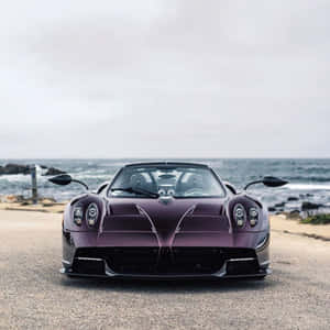 Stunning Pagani Zonda C12 Roadster Cruising Down The Highway Wallpaper