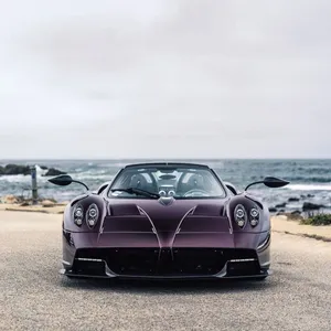 Stunning Pagani Zonda C12 Roadster Cruising Down The Highway Wallpaper