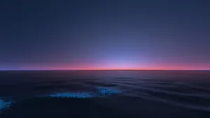 Stunning Panoramic Shot Of A Serene Ocean Scene. Wallpaper