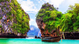 Stunning Panoramic View Of A Pristine Thailand Beach Wallpaper