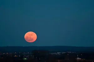 Stunning Perigee Moon Illuminating Night Sky Wallpaper