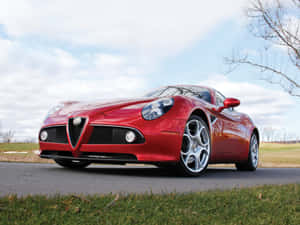 Stunning Red Alfa Romeo 8c Competizione In Action Wallpaper