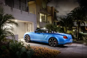 Stunning Red Convertible In Scenic Landscape Wallpaper