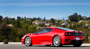 Stunning Red Ferrari 360 Modena On Open Road Wallpaper