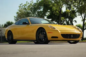 Stunning Red Ferrari 612 Scaglietti On The Road Wallpaper