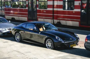 Stunning Red Ferrari 612 Scaglietti On The Road Wallpaper