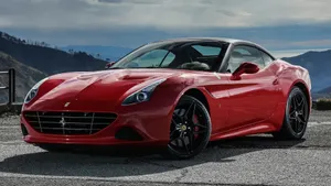 Stunning Red Ferrari California T Cruising The Open Road Wallpaper