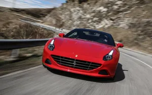 Stunning Red Ferrari California T On The Road Wallpaper