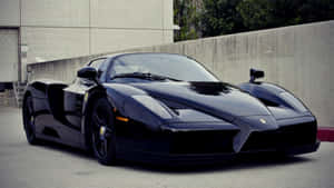 Stunning Red Ferrari Enzo In Motion Wallpaper