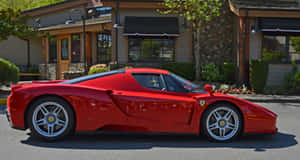 Stunning Red Ferrari Enzo On Display Wallpaper