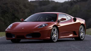 Stunning Red Ferrari F430 In Motion Wallpaper