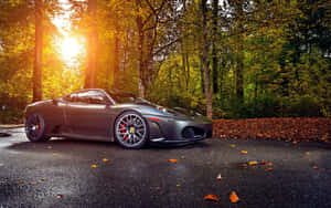 Stunning Red Ferrari F430 On A Beautiful Scenic Road Wallpaper