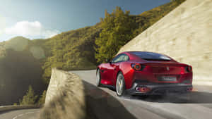 Stunning Red Ferrari Portofino Cruising In Style Wallpaper