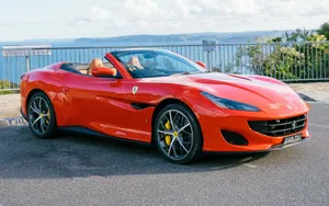 Stunning Red Ferrari Portofino In Motion Wallpaper