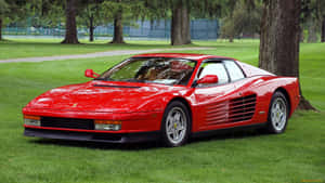 Stunning Red Ferrari Testarossa In Motion Wallpaper