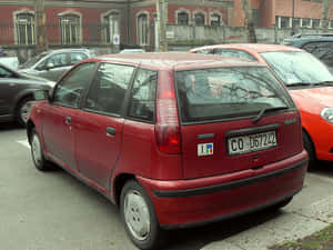 Stunning Red Fiat Punto On The Road Wallpaper