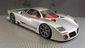 Stunning Red Sports Car Model Wallpaper