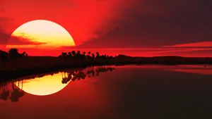 Stunning Red Sunset Over The Horizon Wallpaper