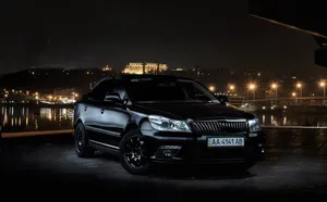 Stunning Silver Skoda Rapid In Motion Wallpaper