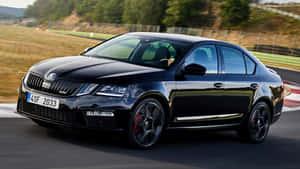 Stunning Skoda Octavia In Dynamic Action Wallpaper