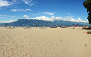 Stunning Spanish Beach At Sunset Wallpaper