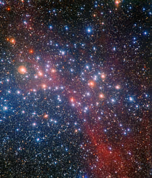 Stunning Star Cluster Illuminating The Night Sky Wallpaper