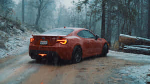 Stunning Subaru Brz Gliding On The Highway Wallpaper