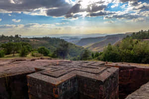 Stunning Sunlight Striking St. George Church In Lalibela Wallpaper