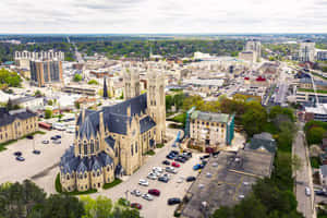 Stunning Sunrise Over The Urban Landscape Of Guelph Wallpaper