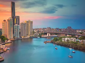 Stunning Sunset Over Brisbane Skyline Wallpaper