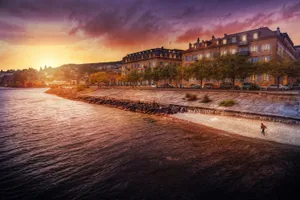 Stunning Sunset Over Lake Neuchâtel, Switzerland Wallpaper