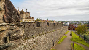 Stunning Sunset Over The Historic Walls Of Londonderry Wallpaper