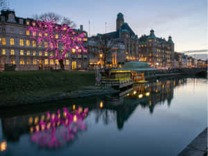 Stunning Twilight View Of Malmö City, Sweden Wallpaper