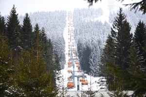 Stunning View Of Snowy Ski Resort Wallpaper