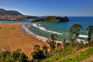 Stunning View Of Sunny Spanish Beach Wallpaper