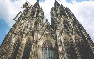 Stunning View Of The Facade Of Cologne Cathedral Wallpaper