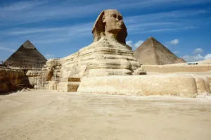 Stunning View Of The Great Sphinx With Pyramids In The Backdrop Wallpaper