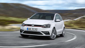 Stunning Volkswagen Polo Cruising On City Streets Wallpaper