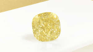 Stunning Yellow Diamond Illuminating The Background Wallpaper