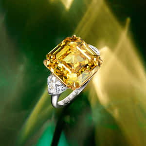 Stunning Yellow Diamond In Close-up View Wallpaper