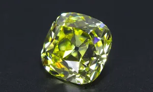 Stunning Yellow Diamond On A Black Background Wallpaper