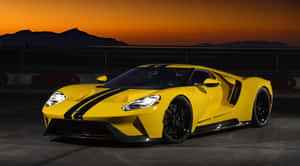 Stunning Yellow Sports Car On The Road Wallpaper