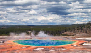 Stunning Yellowstone Geyser Erupting At Sunrise Wallpaper