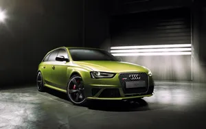 Stunningly Bold Audi Rs4 In Action Wallpaper