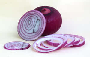 Stunningly Colored Purple Onions In A Market Wallpaper