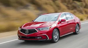 Stylish Acura Rlx Luxury Sedan In Motion Wallpaper