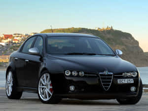 Stylish Alfa Romeo 159 In Vibrant Red Wallpaper