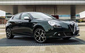 Stylish Alfa Romeo Giulietta On The Road Wallpaper