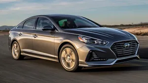 Stylish And Powerful Hyundai Sonata On Open Road Wallpaper